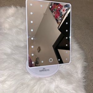 IMPRESSIONS VANITY MIRROR